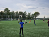 Laatste training S.K.N.W.K. JO11-1JM (partijtje tegen de ouders) van maandag 27 mei 2024 (119/137)